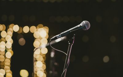 What are some small steps to gradually face the fear of public speaking?